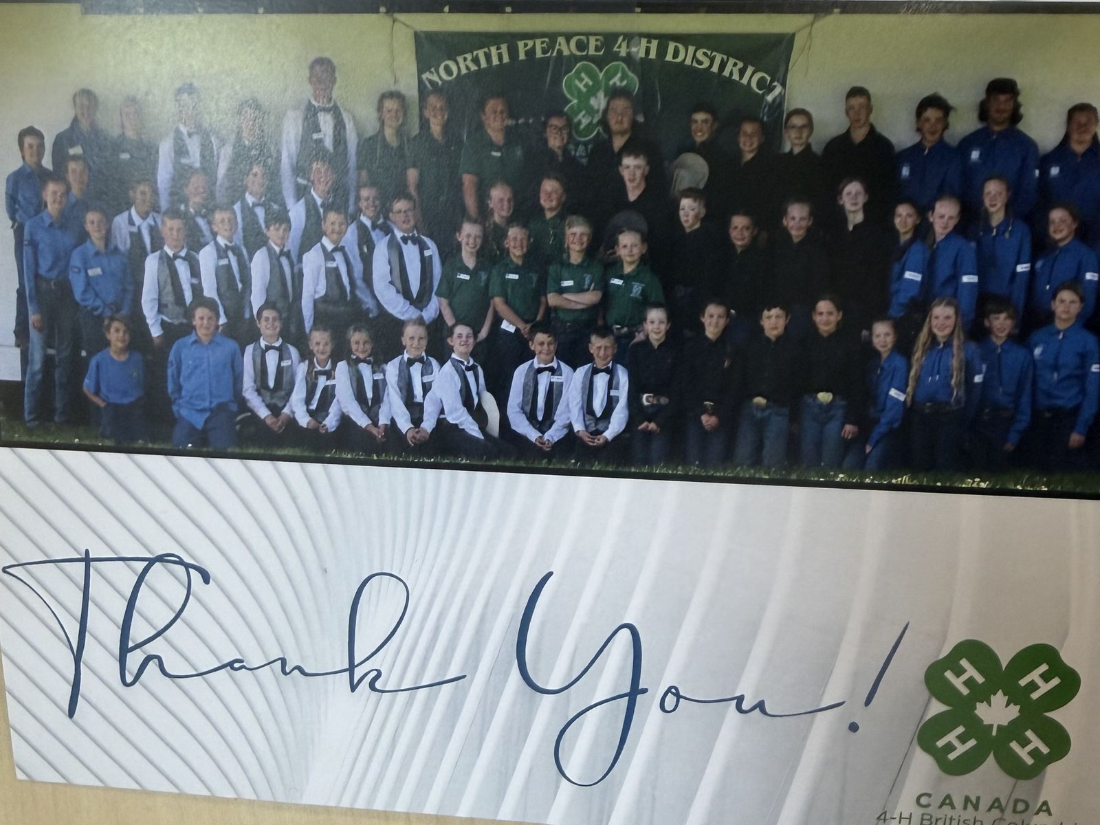 A thank-you card from the North Peace 4-H District with a group photo of the club